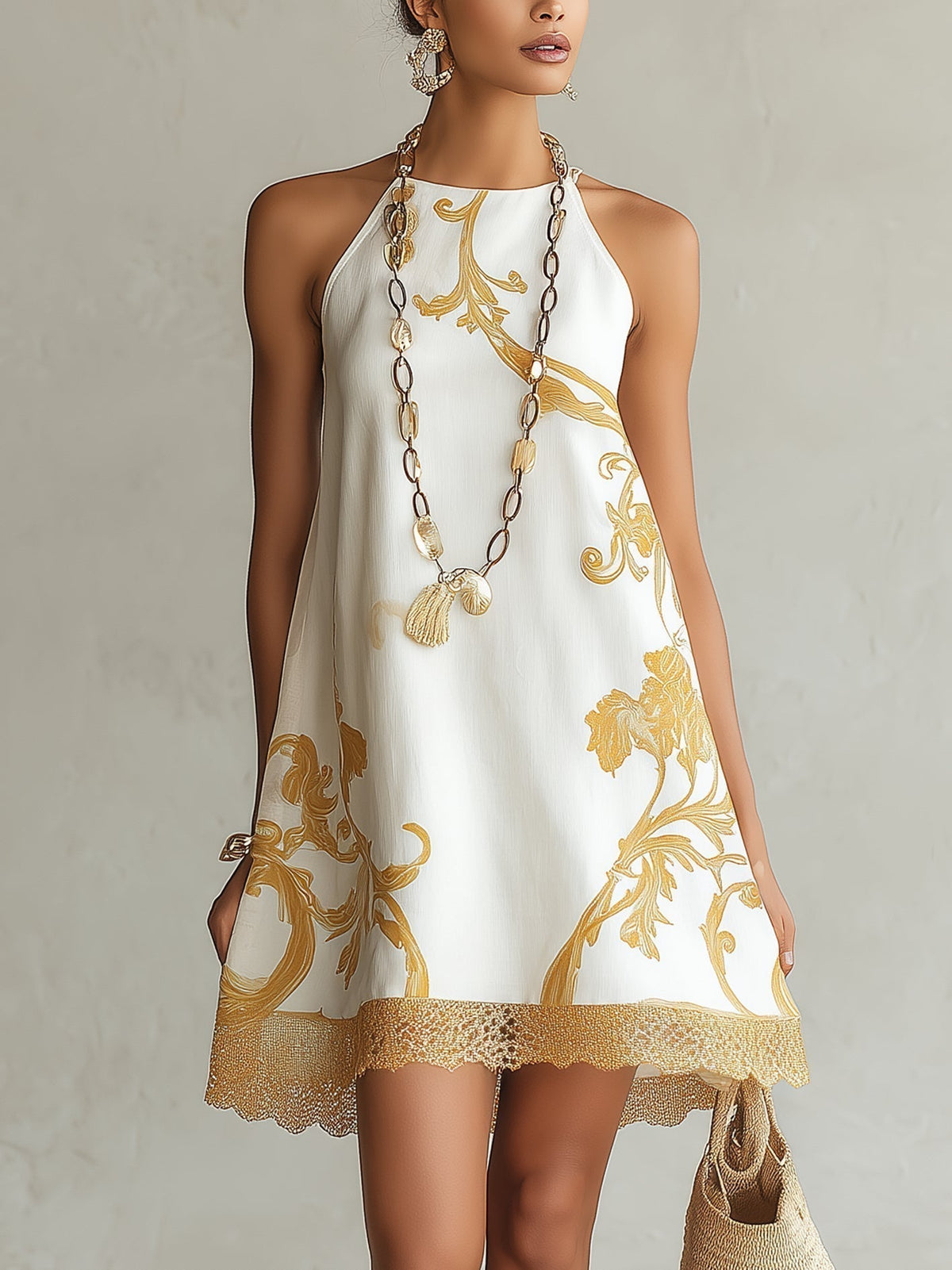Elena | Vestido mini blanco de encaje con motivos dorados